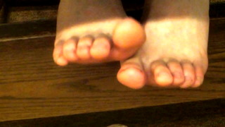 Candid Dirty Feet On Desk Rest